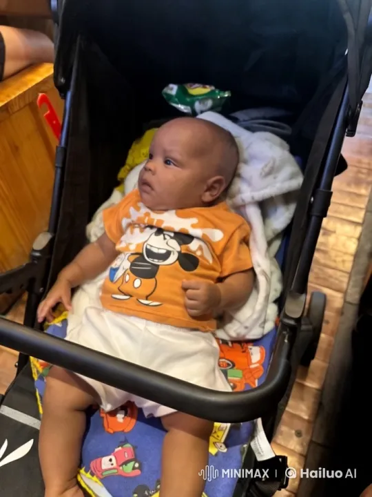 Baby Dancing Joyfully in Stroller at Home – AI Generated Video | Hailuo AI
