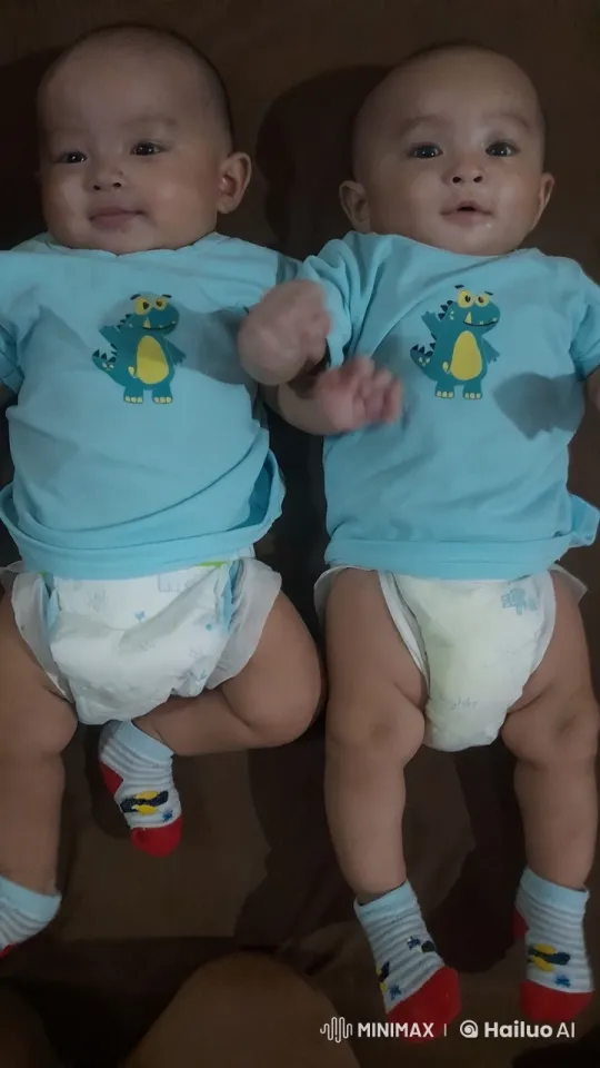 Twins Joyfully Dance in Matching Dino Shirts – AI Generated Video | Hailuo AI