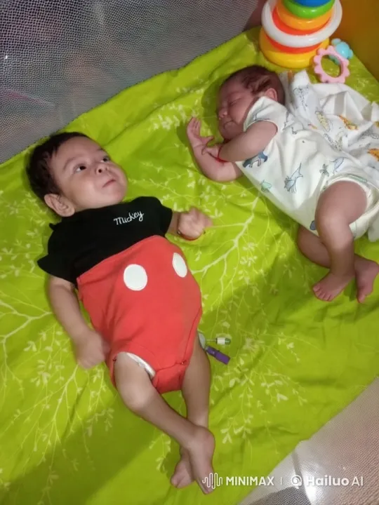 Babies on Vibrant Mat with Toys – AI Generated Video | Hailuo AI