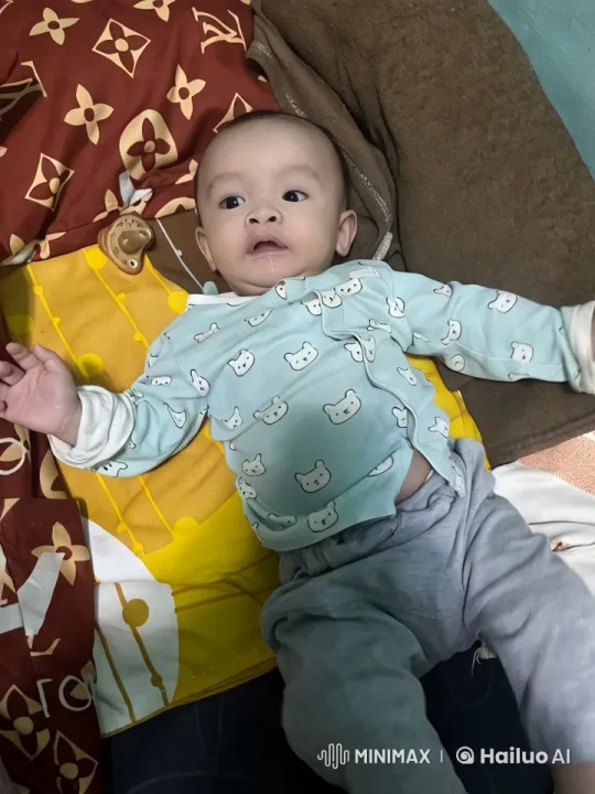Baby's Playful Kungfu Dance in Colorful Bed Setting – AI Generated Video | Hailuo AI