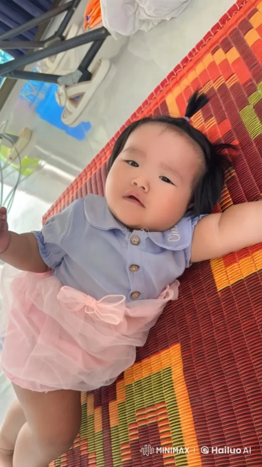 Baby's Joyful Playtime in Colorful Outfit – AI Generated Video | Hailuo AI