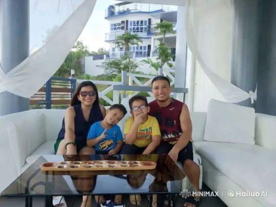 Family Enjoying Playful Kungfu Gestures on Patio – AI Generated Video | Hailuo AI