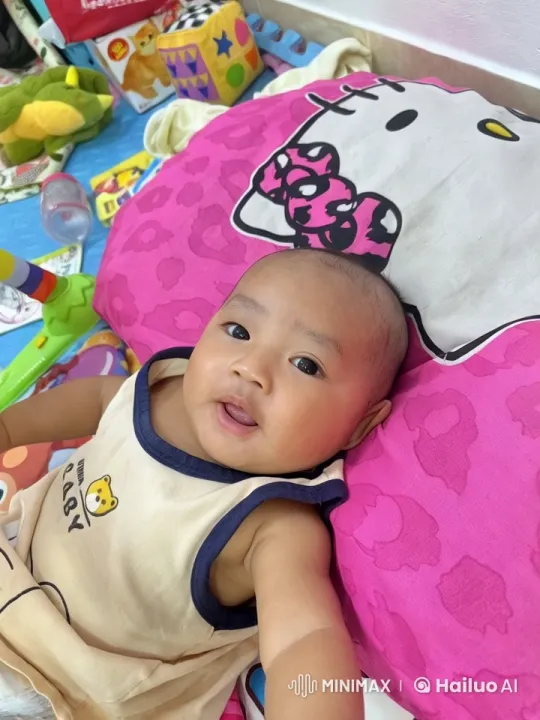 Baby Dancing with Joy on Pink Pillow – AI Generated Video | Hailuo AI