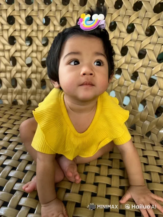Baby Dancing Joyfully in Woven Chair – AI Generated Video | Hailuo AI
