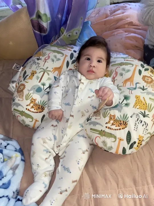 Baby Dancing Playfully on Colorful Bed – AI Generated Video | Hailuo AI