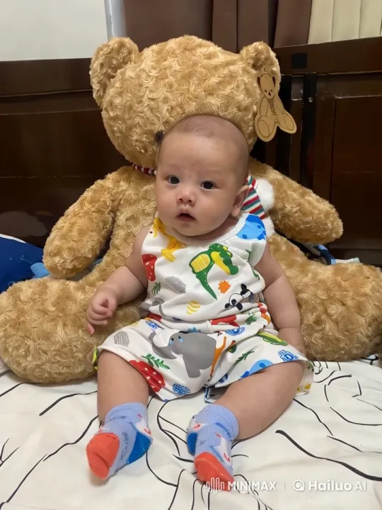 Baby with Teddy Bear on Cozy Bed – AI Generated Video | Hailuo AI