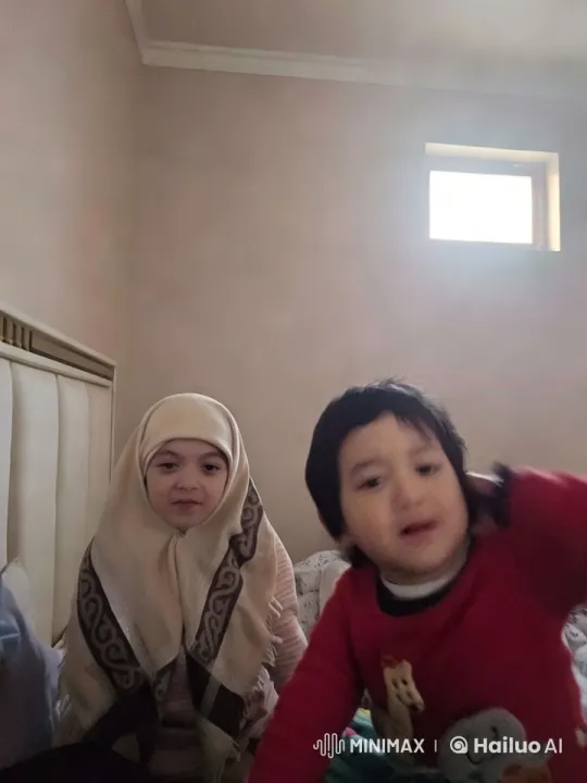 Child Dancing Enthusiastically on Bed with Warm Atmosphere – AI Generated Video | Hailuo AI