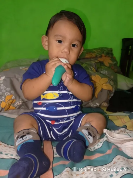 Child Examining Object on Nautical-Themed Bed – AI Generated Video | Hailuo AI