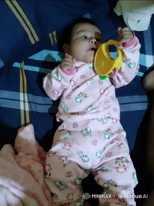 Baby's Playful Moments on Cozy Bed with Toy – AI Generated Video | Hailuo AI