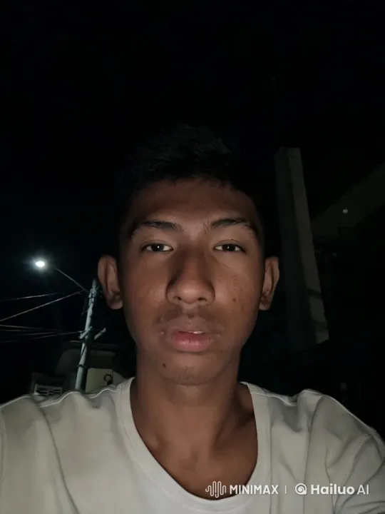 Nocturnal Portrait: Young Man Under Streetlight – AI Generated Video | Hailuo AI