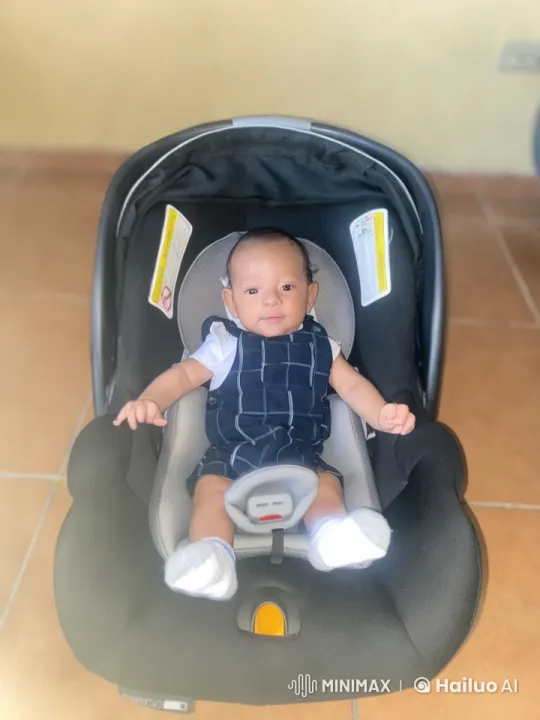 Baby Dancing Joyfully in Car Seat Indoors – AI Generated Video | Hailuo AI