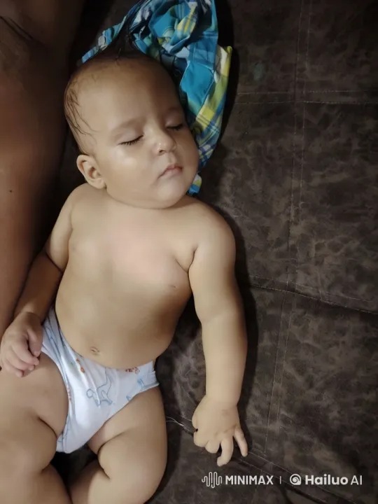 Baby's Serene Moments on Couch with Soft Focus – AI Generated Video | Hailuo AI