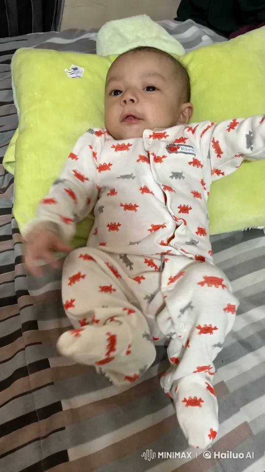Baby's Playful Kungfu Dance on Striped Bedspread – AI Generated Video | Hailuo AI