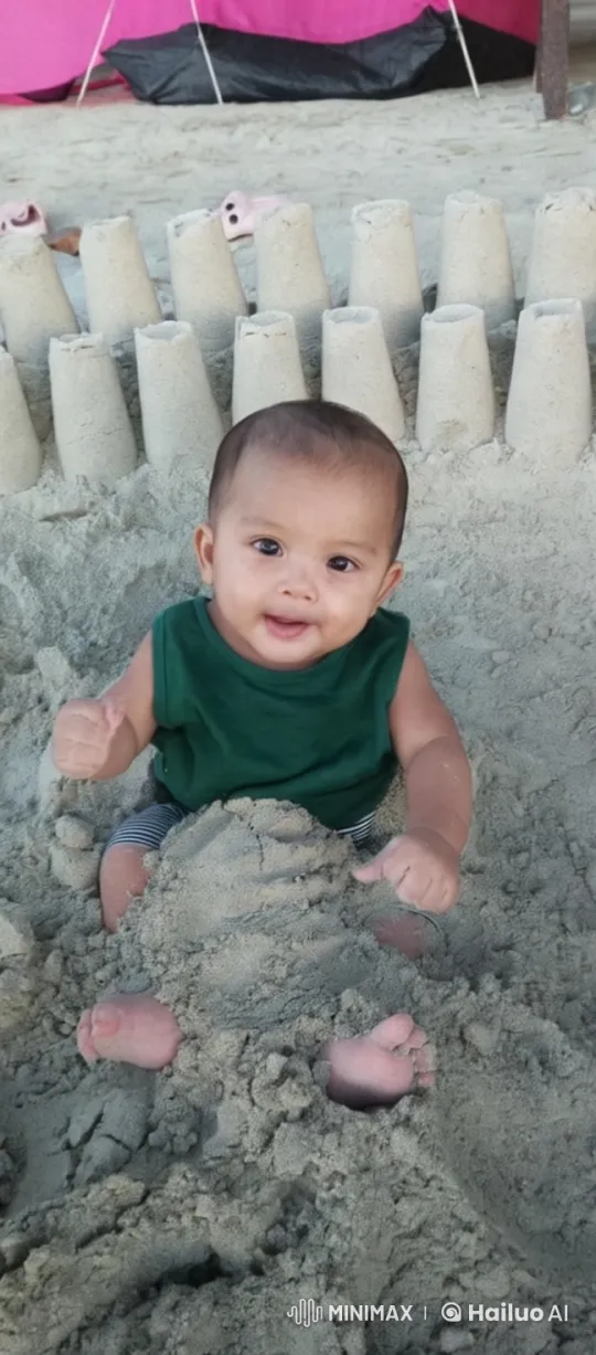 Baby Dancing Playfully Amidst Sandcastles – AI Generated Video | Hailuo AI