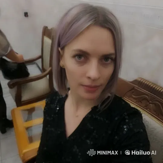Elegant Person in Black Sequin Top in White-Tiled Room – AI Generated Video | Hailuo AI