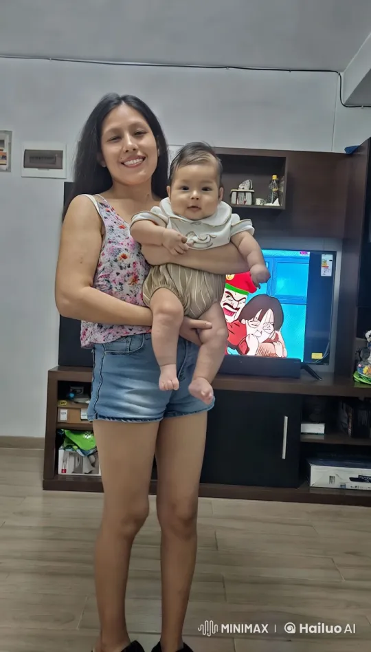 Woman and Baby Mimic Kungfu in Cozy Living Room – AI Generated Video | Hailuo AI