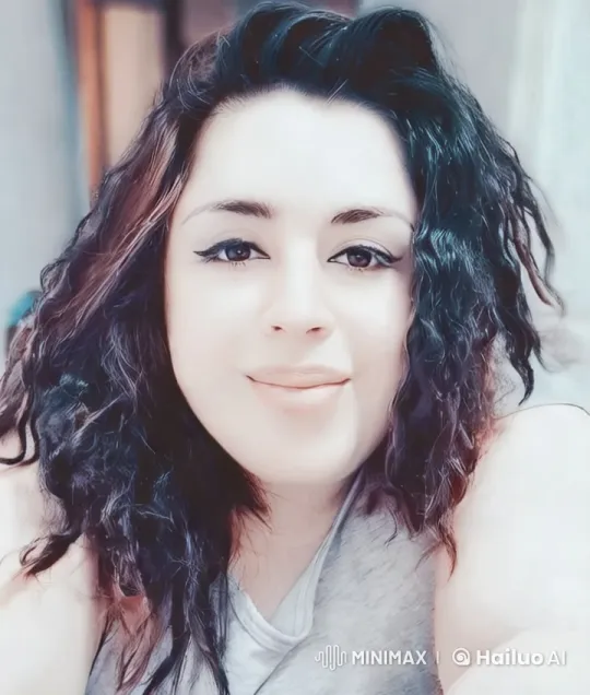 Close-up and Tracking Shot of a Person with Flowing Hair – AI Generated Video | Hailuo AI