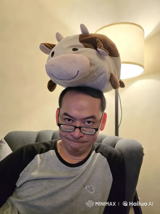 Person and Toy Cow Dance in Whimsical Short Clip – AI Generated Video | Hailuo AI