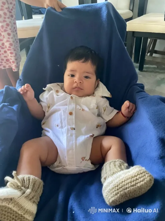 Baby Dancing Joyfully on Blue Blanket Indoors – AI Generated Video | Hailuo AI