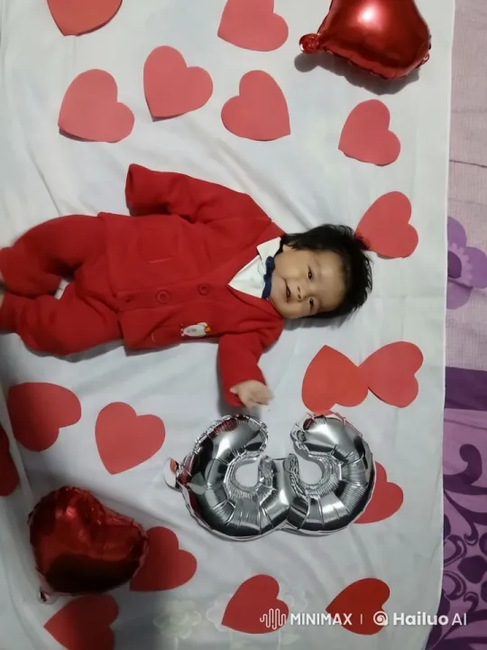 Baby Celebrated in Red Hearts Decor – AI Generated Video | Hailuo AI