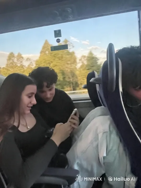 Young Couple Shares Intimate Moment on Scenic Bus Ride – AI Generated Video | Hailuo AI