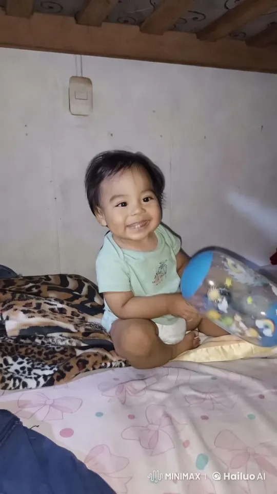 Baby Dancing Joyfully on Patterned Blankets – AI Generated Video | Hailuo AI