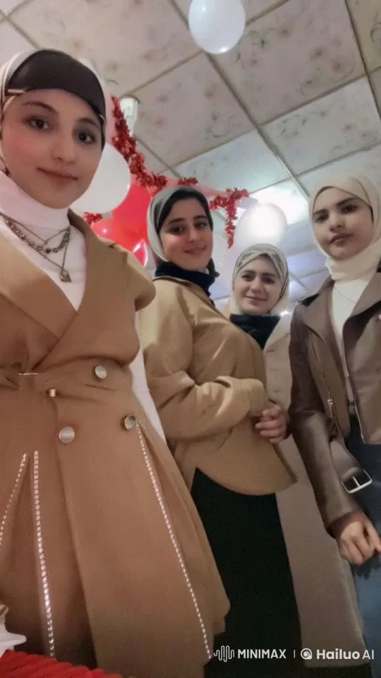 Women in Coats and Headscarves Engage in Festive Dance and Playful Fight – AI Generated Video | Hailuo AI