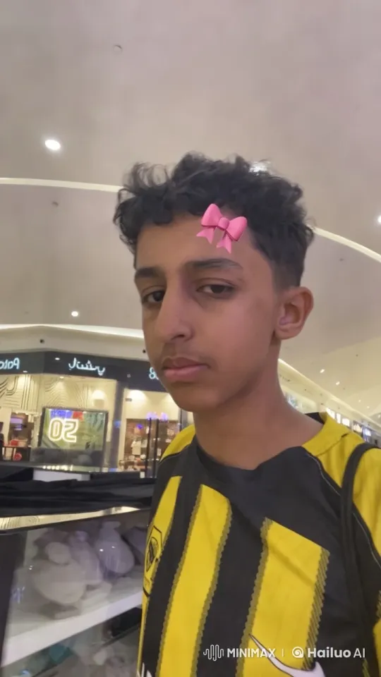 Young Man Smokes in Bustling Shopping Mall – AI Generated Video | Hailuo AI