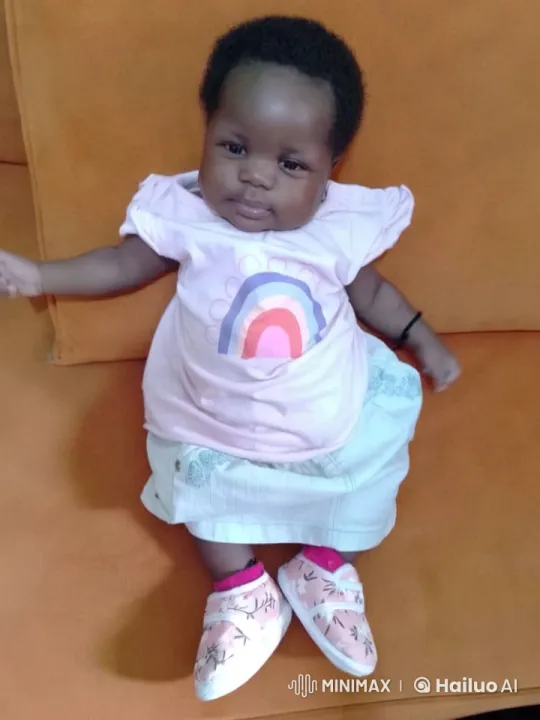 Baby's Animated Greeting on Vibrant Orange Couch – AI Generated Video | Hailuo AI