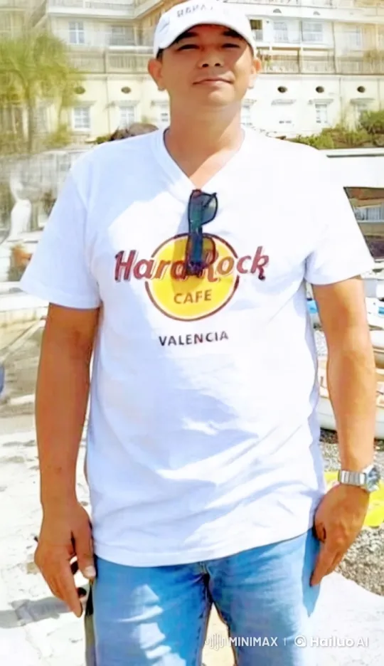 Vibrant Valencia: Man Enjoying Sunny Day at Elegant Building – AI Generated Video | Hailuo AI