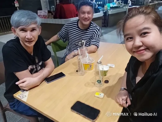 Casual Dining Scene with Engaged Individuals – AI Generated Video | Hailuo AI