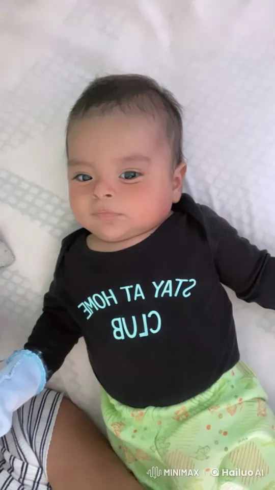 Baby Dances with Joy on Minimalist Bed – AI Generated Video | Hailuo AI