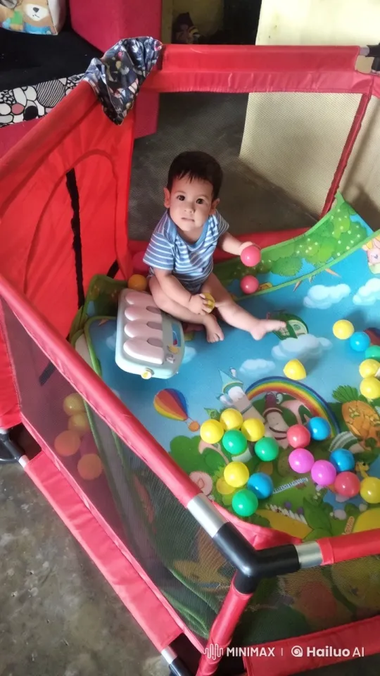 Baby Playing in Colorful Playpen with Toy Piano – AI Generated Video | Hailuo AI