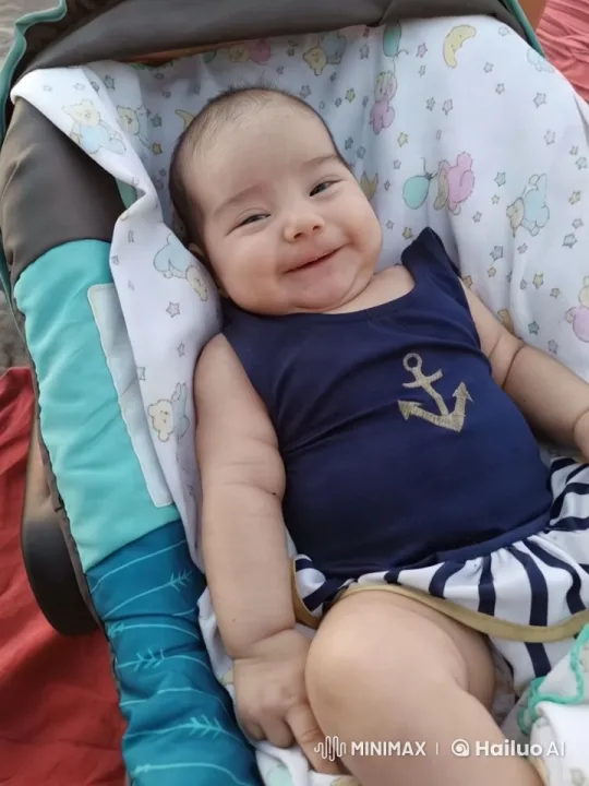 Baby Dancing with Joy in Colorful Carrier – AI Generated Video | Hailuo AI