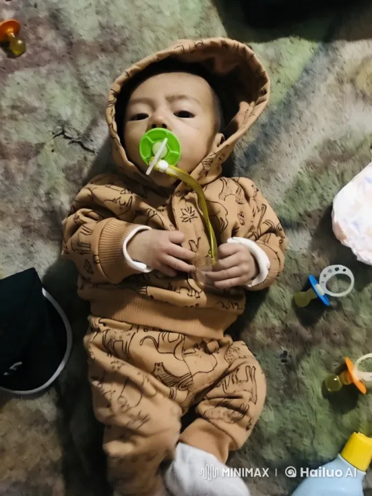 Baby Dancing Playfully on Blanket with Pacifier – AI Generated Video | Hailuo AI