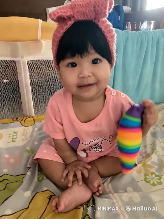 Baby Dancing Joyfully on Colorful Bed – AI Generated Video | Hailuo AI