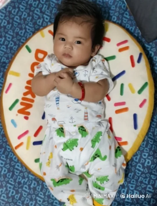 Baby Dancing with Joy on Colorful Cushion – AI Generated Video | Hailuo AI