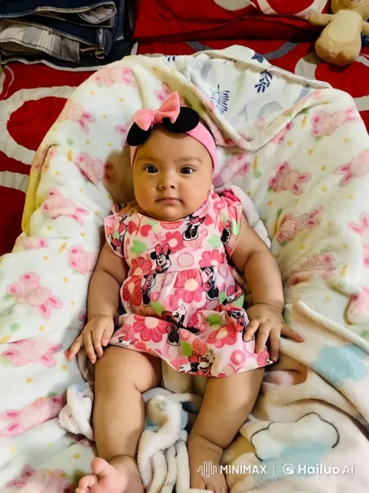 Baby's Joyful Dance and Play in Colorful Blanket – AI Generated Video | Hailuo AI