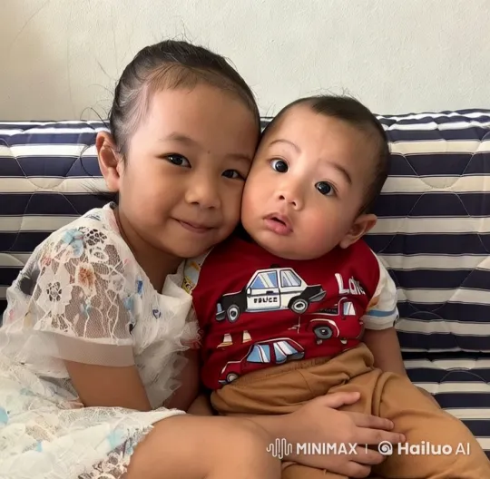 Siblings Embrace on Striped Couch – AI Generated Video | Hailuo AI