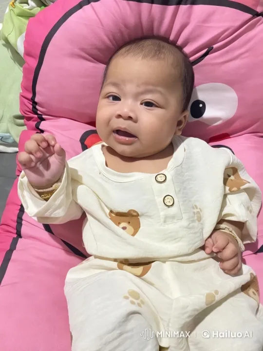 Baby Dancing Joyfully on Pink Cushion – AI Generated Video | Hailuo AI