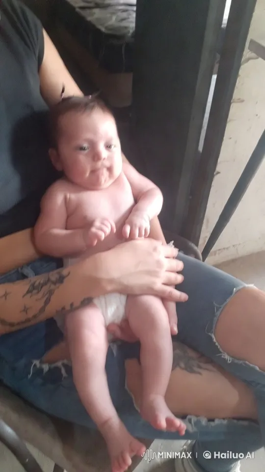 Intimate Bond: Adult and Baby in Cozy Indoor Setting – AI Generated Video | Hailuo AI