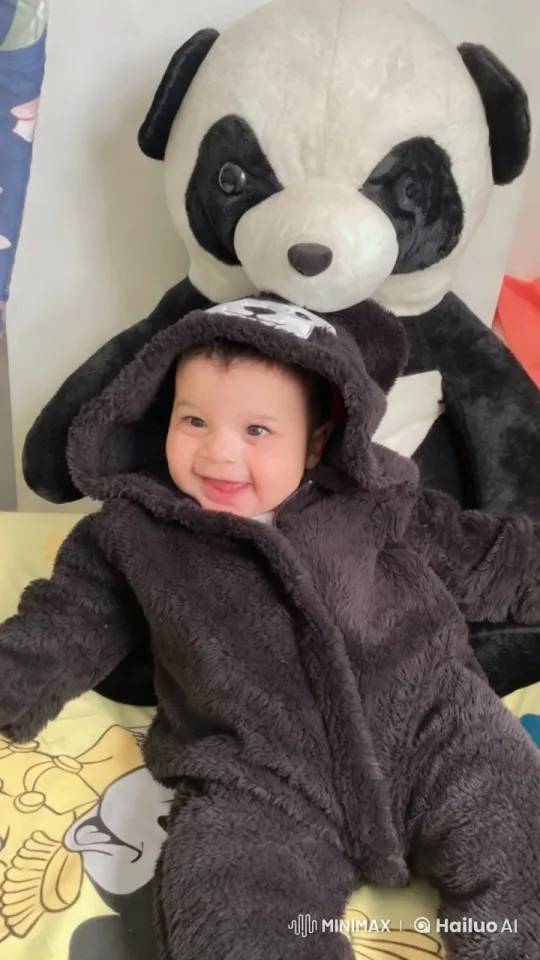 Baby in Panda Onesie Plays with Toys – AI Generated Video | Hailuo AI
