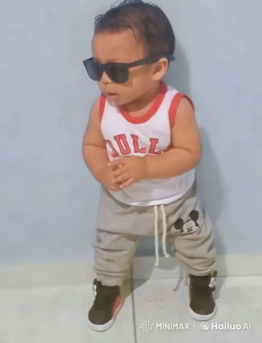 Toddler Showcases Outfit with Minimalist Aesthetic – AI Generated Video | Hailuo AI