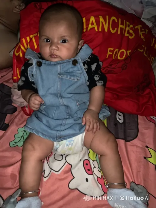 Baby Dancing Joyfully on Colorful Bedspread – AI Generated Video | Hailuo AI