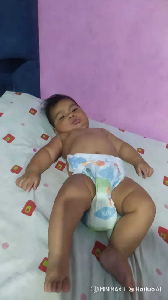 Baby's Playful Actions Against Colorful Background – AI Generated Video | Hailuo AI