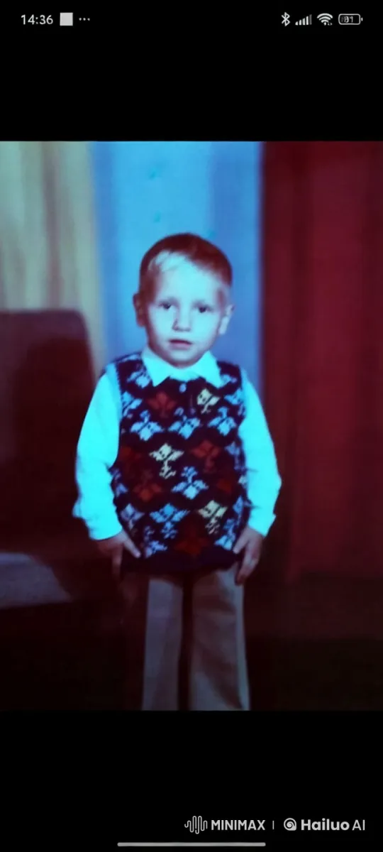Boy Laughs and Blows Kiss in Colorful Setting – AI Generated Video | Hailuo AI