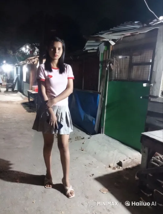 Young Woman on Quiet Night Street with Aesthetic Lighting – AI Generated Video | Hailuo AI