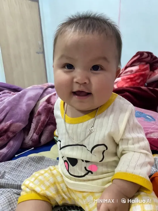 Child Dancing Joyfully on Colorful Bed – AI Generated Video | Hailuo AI