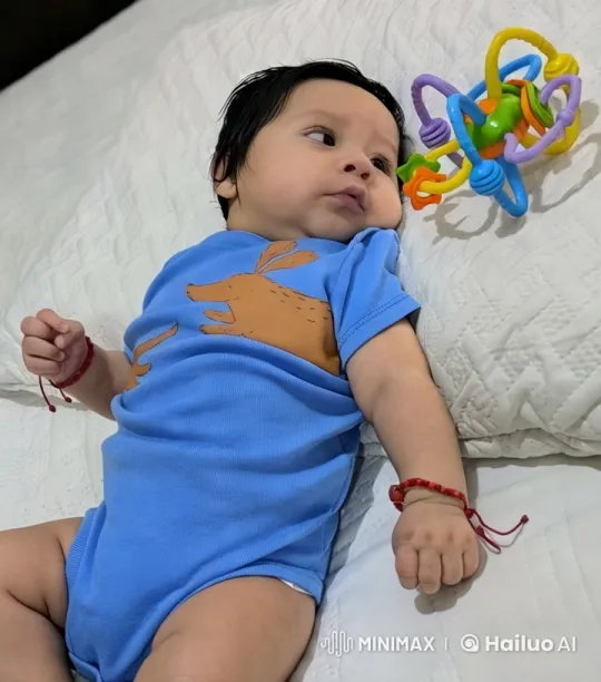 Baby Mimics Kung Fu on Quilted Bed – AI Generated Video | Hailuo AI