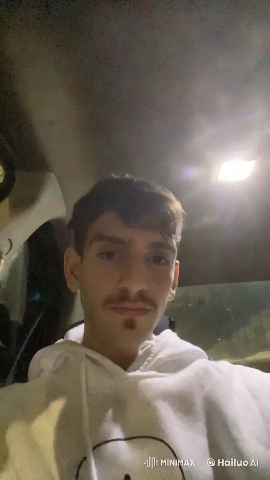 Introspective Car Scene with Smoking Person – AI Generated Video | Hailuo AI